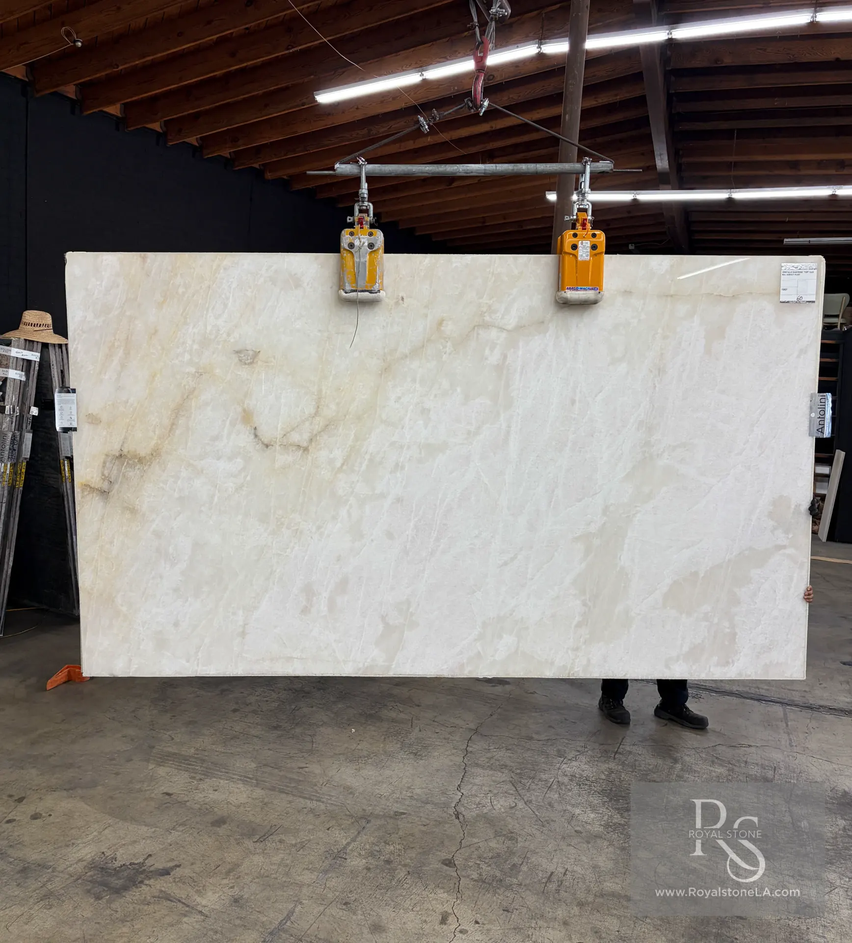 Antolini Cristallo Babyrose Gold Top YG627 polished quartzite slab, 78 by 136 inches, selected for Pacific Palisades fire rebuild homes and photographed at Royal Stone Los Angeles
