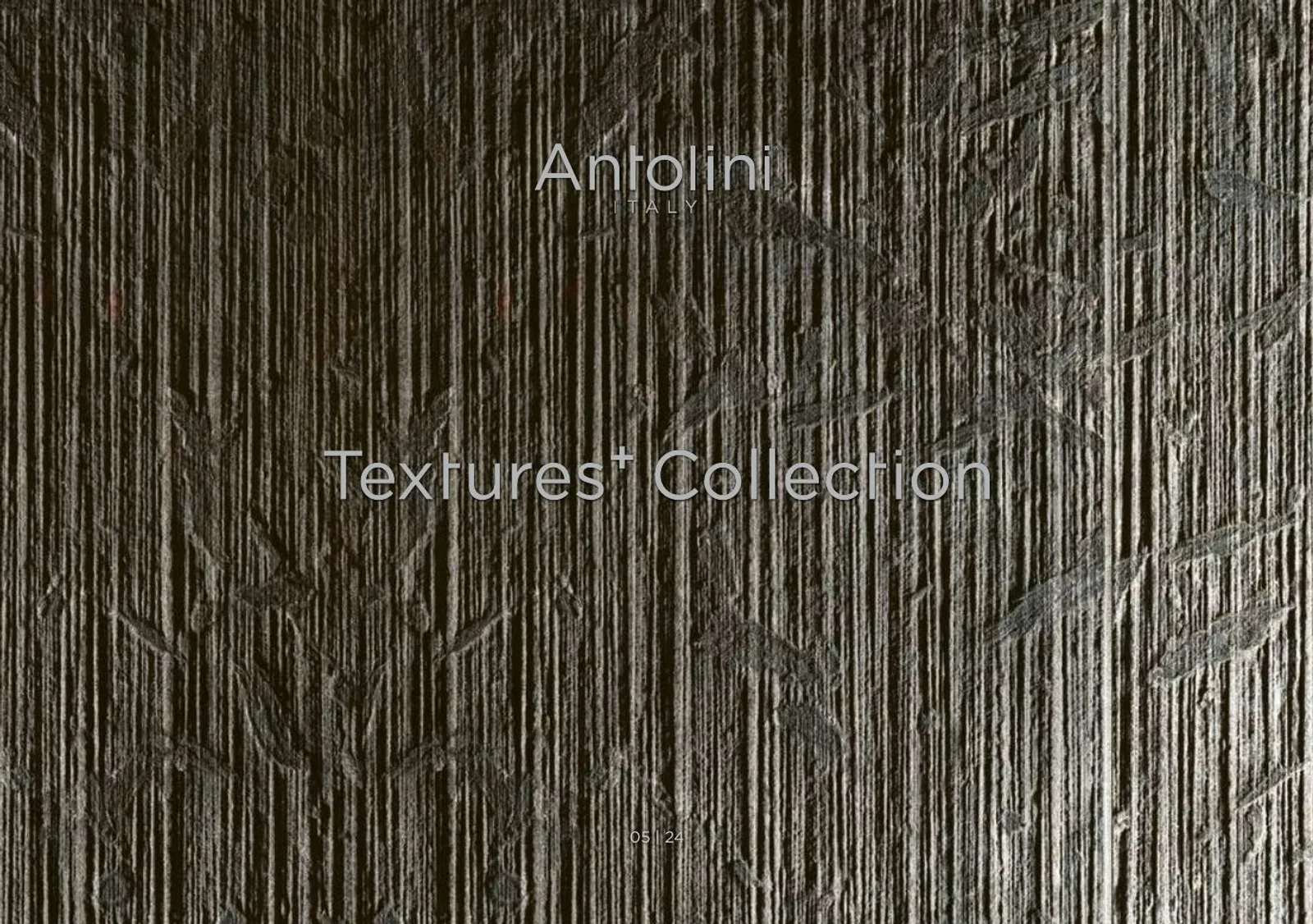 Antolini Textures+ Collection — dark textured stone surface, the collection's signature visual