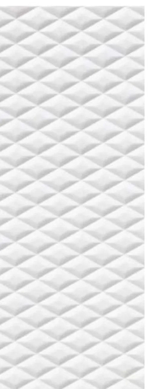 Quilt finish on Antolini stone — soft padded fabric texture