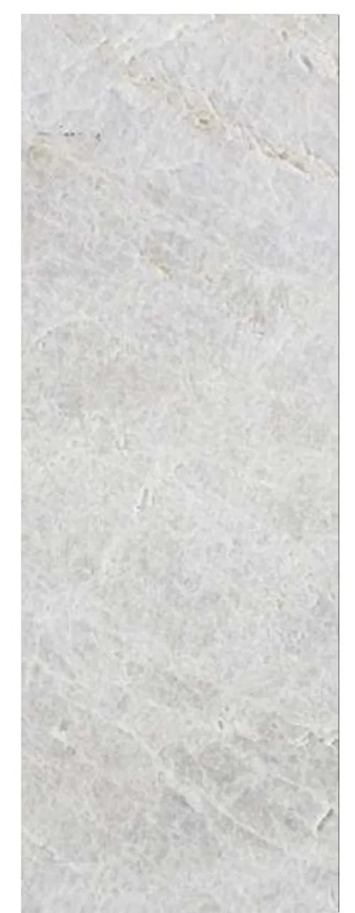 Rivenplus finish on Antolini stone — fine close vertical ribbing