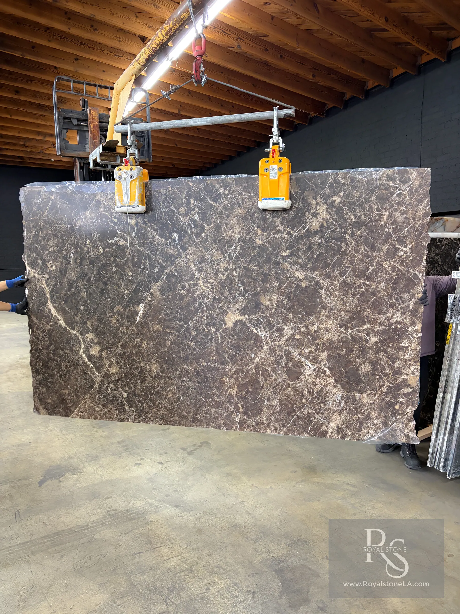 2cm Antolini Dark Emperador Henraux Honed marble slab, 69 by 110 inches — deep cocoa and caramel ground with sharp white calcite veining, full slab photographed at Royal Stone Los Angeles
