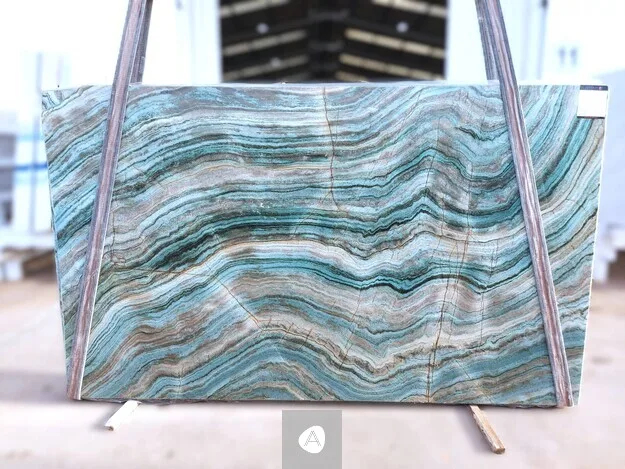 Antolini Fuxita Jade quartzite slab with banded turquoise-and-jade movement, polished finish