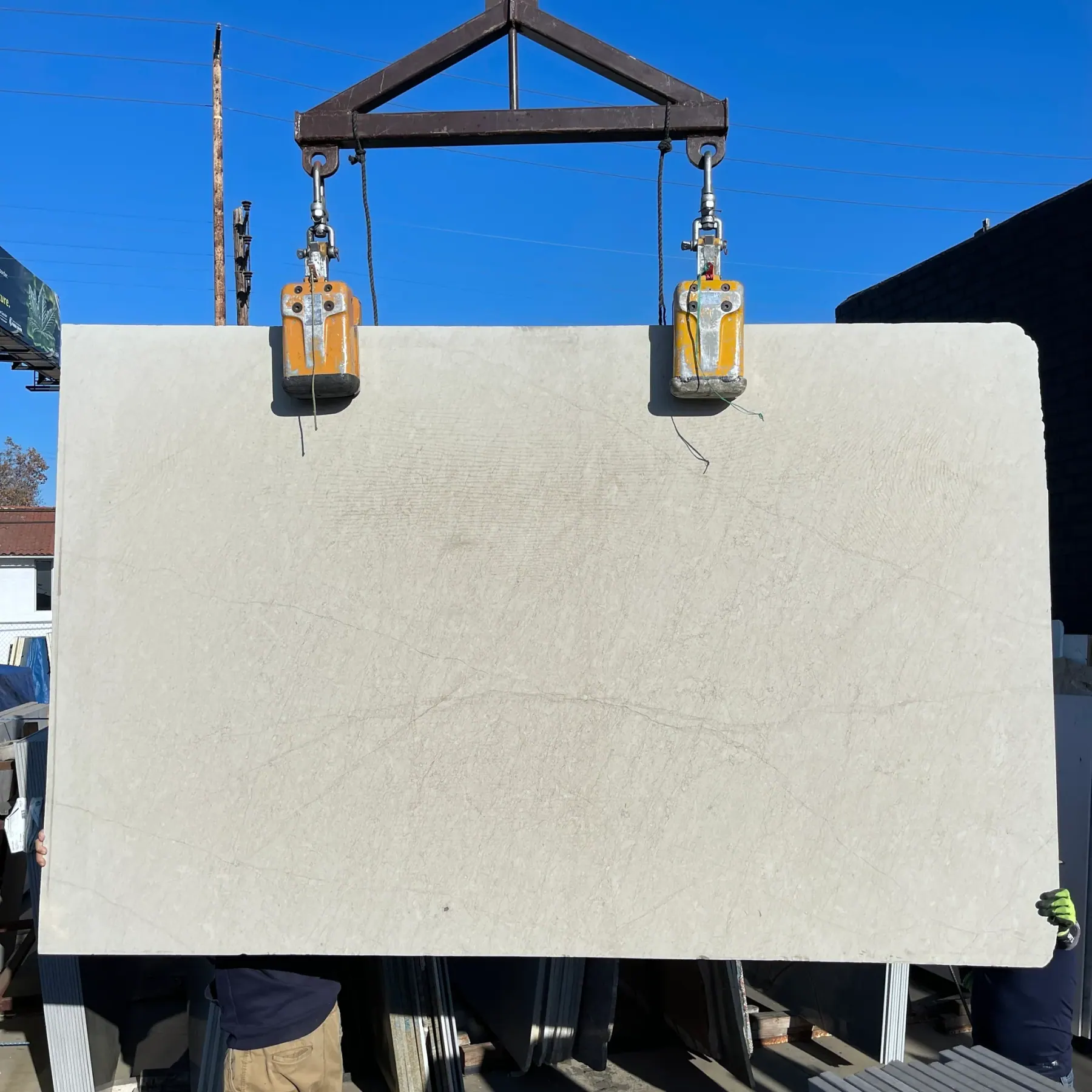 Antolini Taupe limestone honed slab at Royal Stone Los Angeles, near-uniform warm taupe body with faint hairline veining
