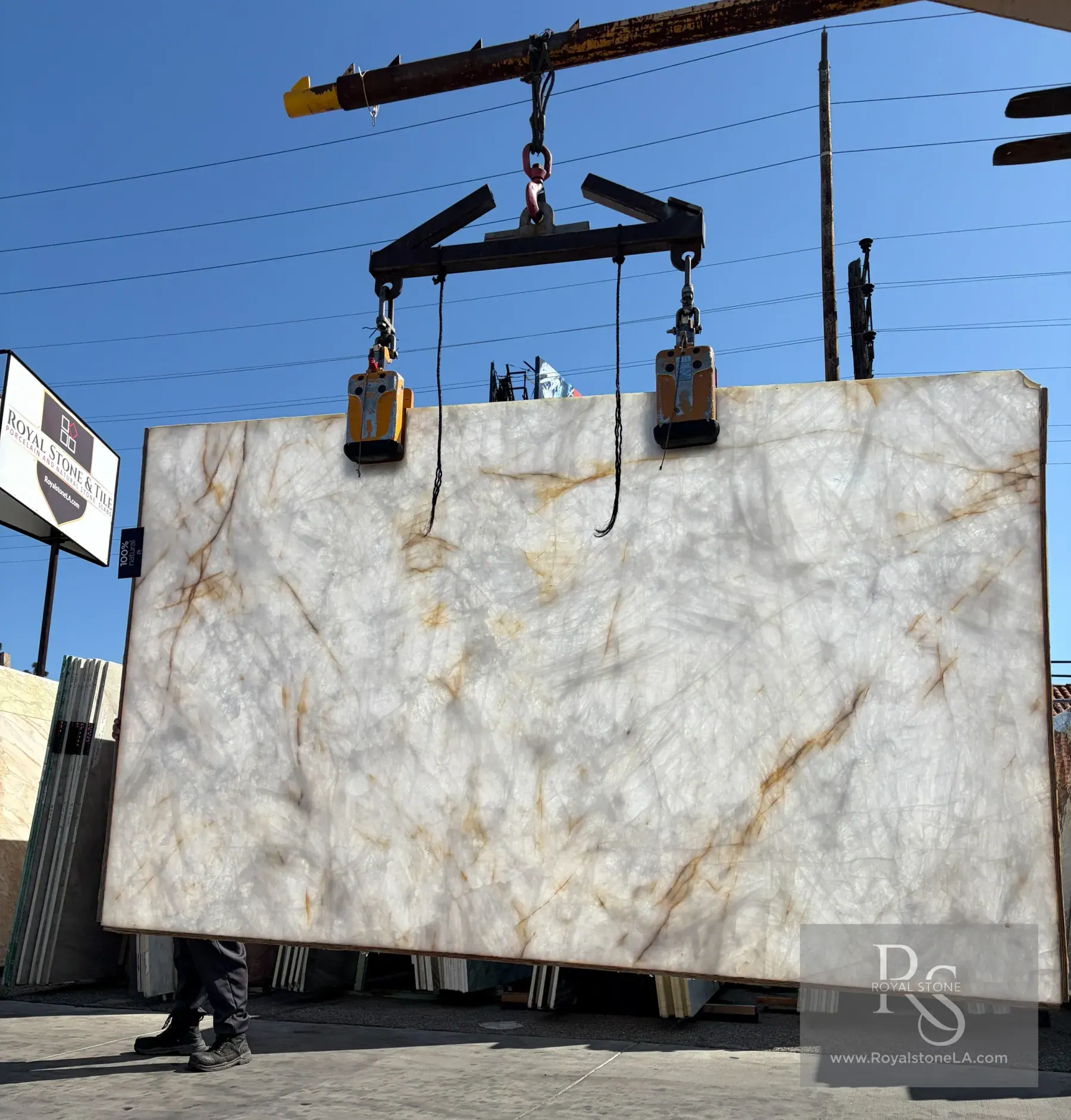 Antolini Traslux quartzite slab at Royal Stone, translucent crystalline body with soft-leather finish
