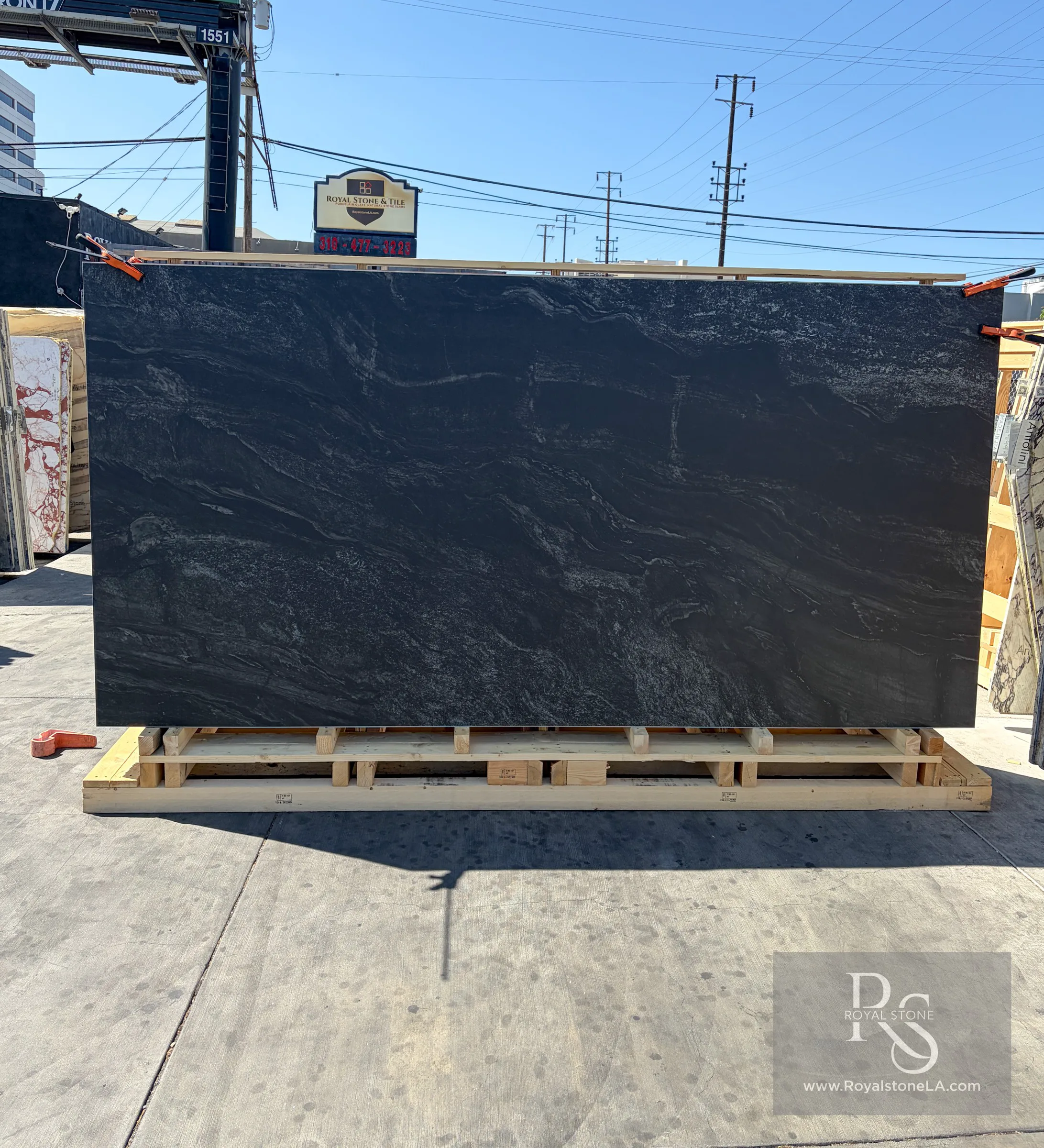 1.2cm Ava Stone Dark Paradise Italian porcelain panel, textured finish, 63 by 126 inch jumbo format, deep dark ground with bright mineral veining, freshly imported and stocked at Royal Stone Los Angeles