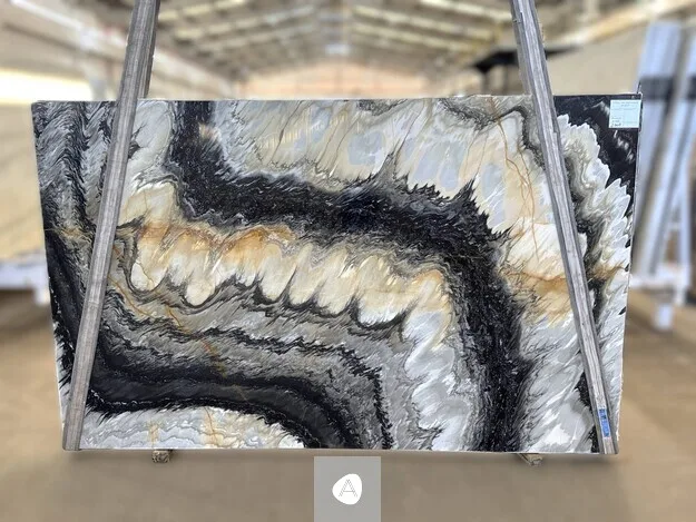 Cipollino Greywave Classic marble slab with cinematic black-and-gold wave over a pearl-grey ground, polished finish