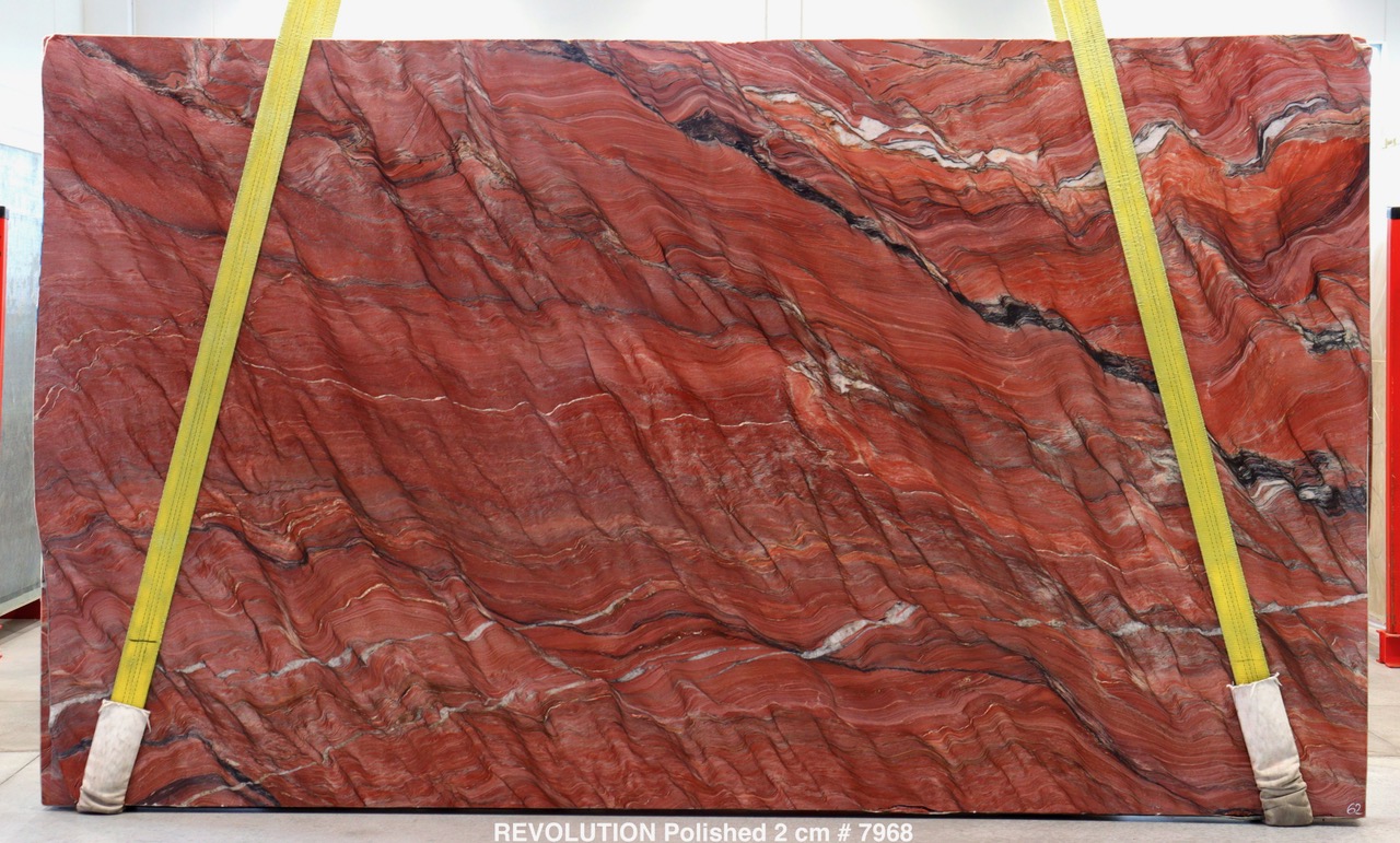 Revolution quartzite slab with brick-red field and dramatic diagonal banded movement, polished