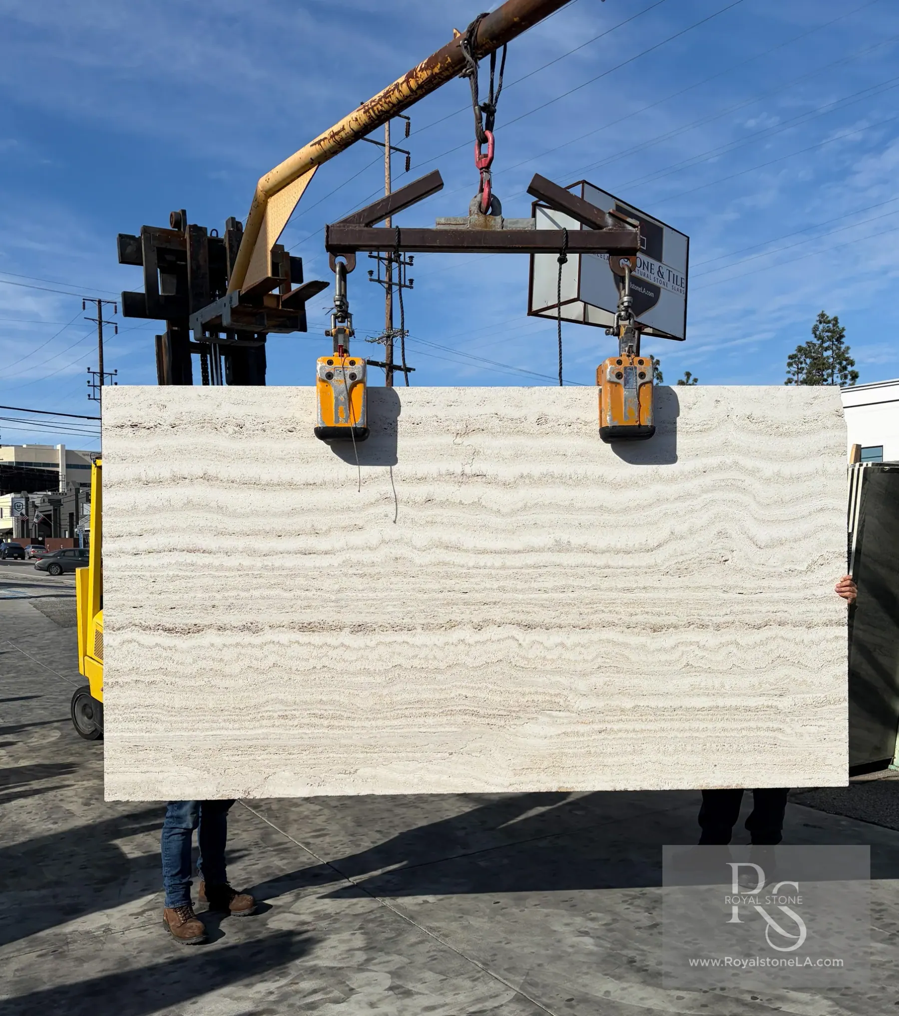 2cm Travertino Sandblasted Cemento vein cut ivory travertine slab at Royal Stone Los Angeles, warm cream and ivory horizontal stratification with delicate wavy bedding and sandblasted matte texture, 63 by 116 inches