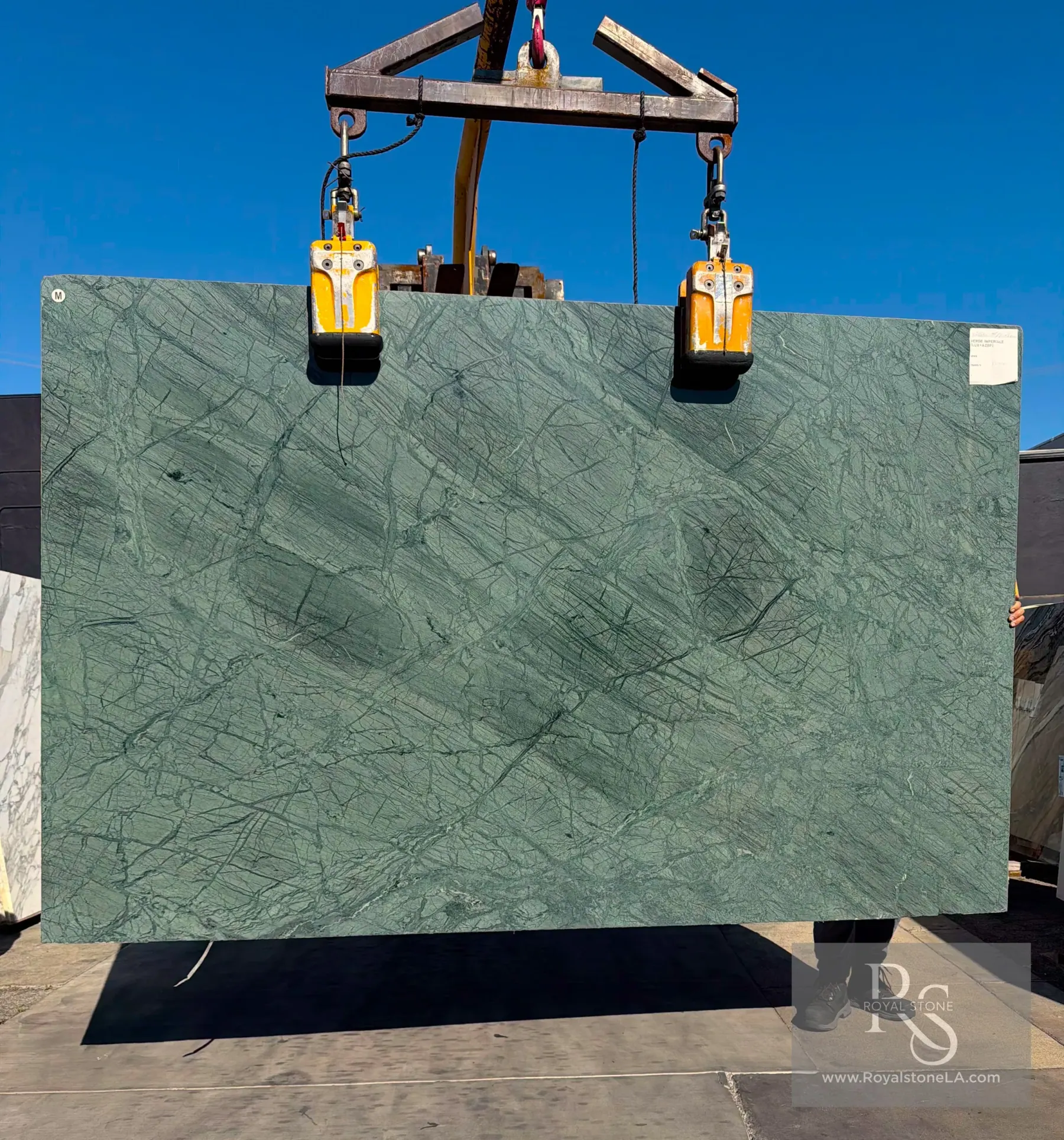Antolini Verde Imperiale polished green marble slab at Royal Stone, deep forest field with charcoal veining