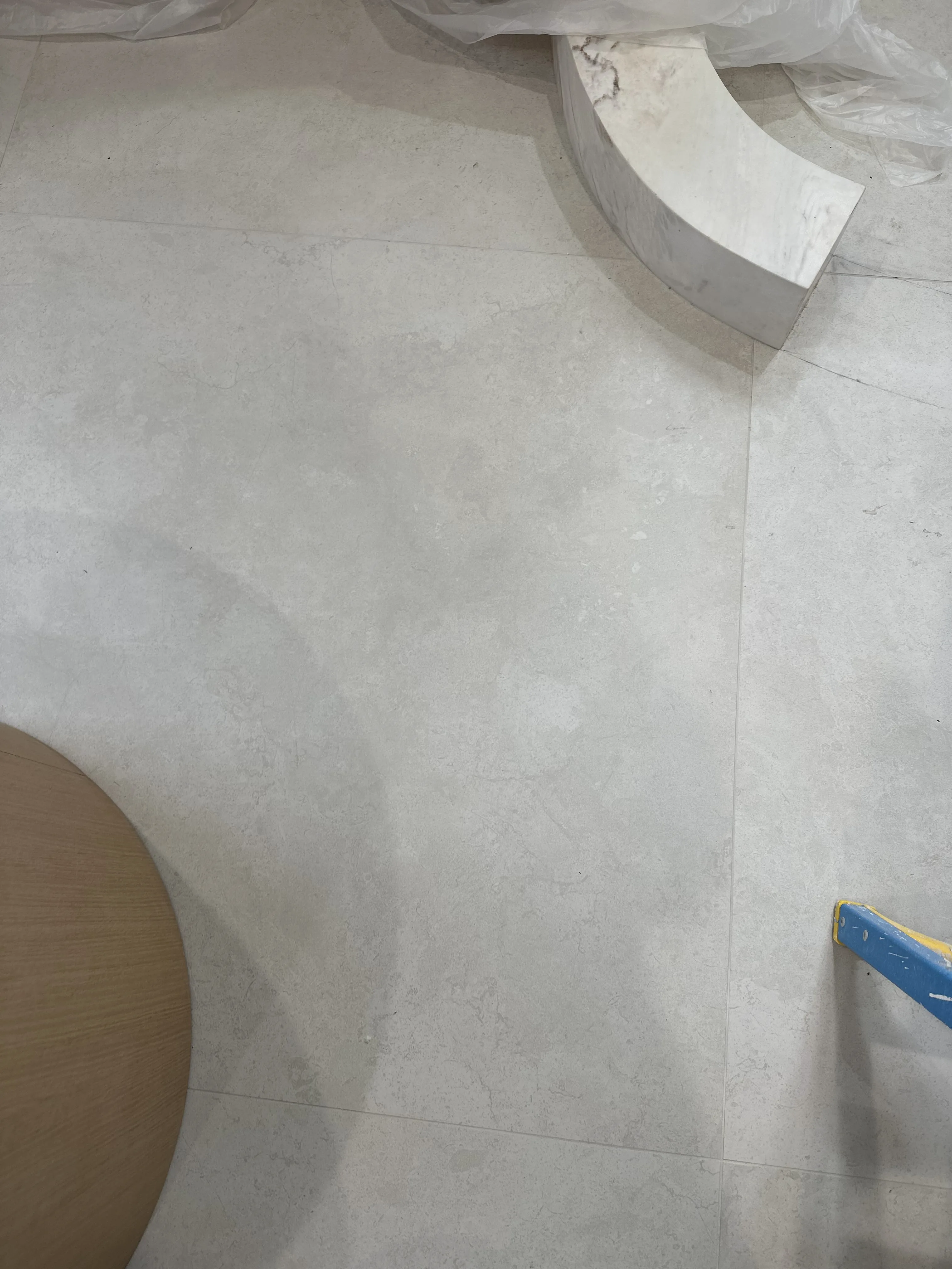 Refin Petra Azul honed 48 by 48 large-format porcelain tile installed as a feature wall