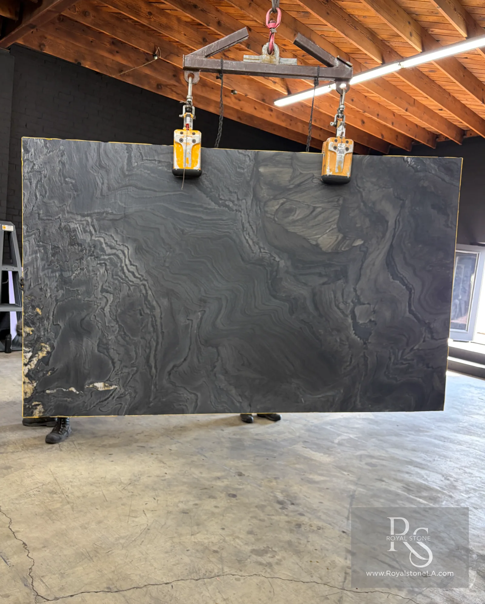Obsidian Fusion Nero quartzite slab with a honed finish, 78 by 128 inches, at the Royal Stone yard in Los Angeles