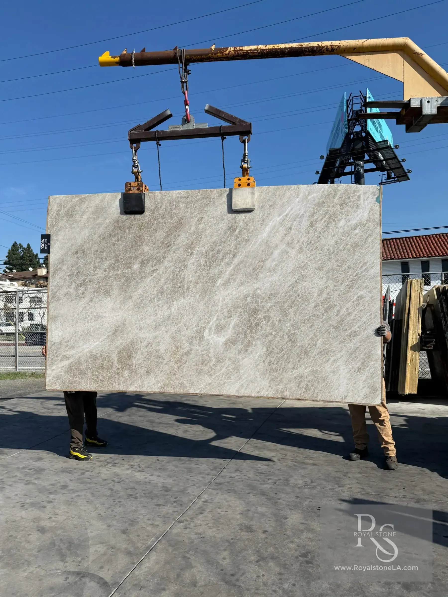 Royal Stone Los Angeles quartzite slab being lifted in the yard