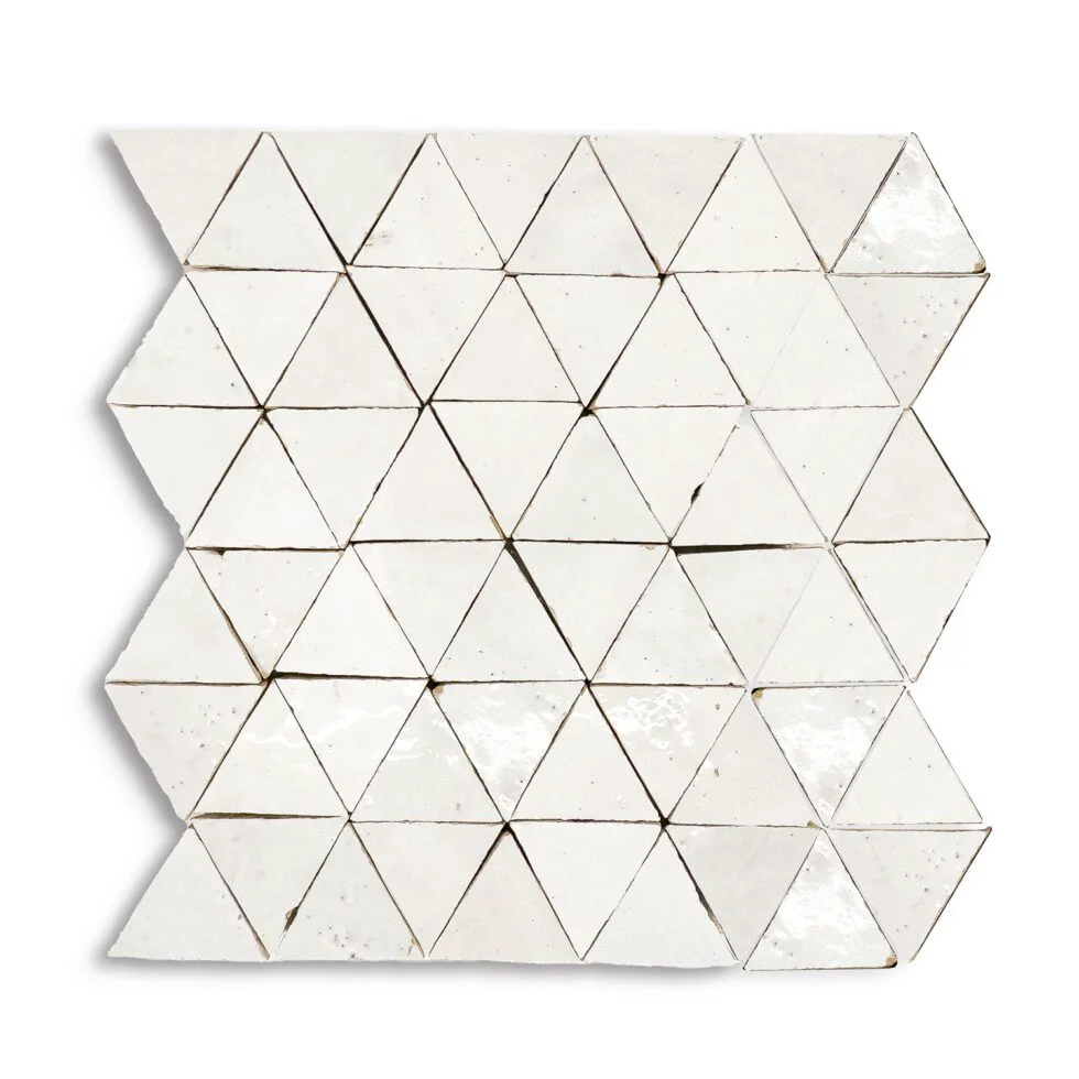 Natural marble triangle mosaic in alternating points, hand-cut and laid tight, photographed at the Royal Stone yard